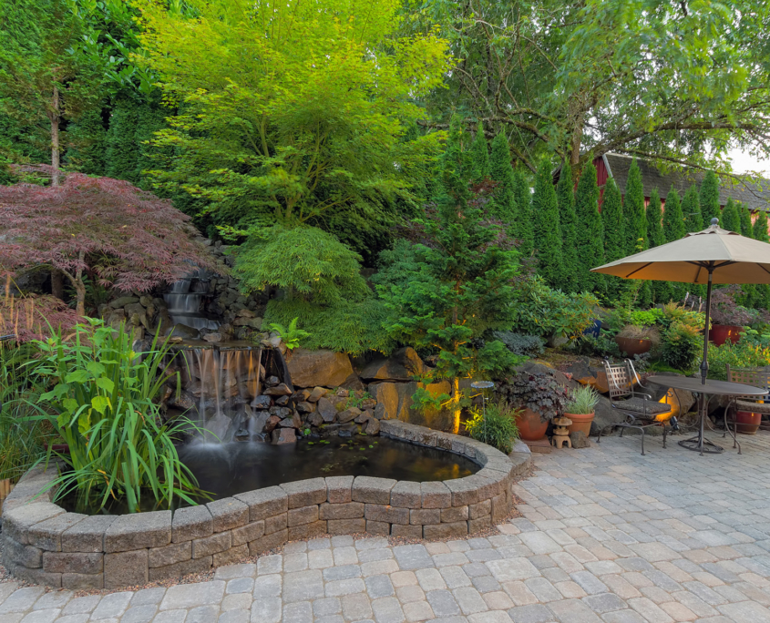 Backyard Landscaping Patio with Waterfall Pond
